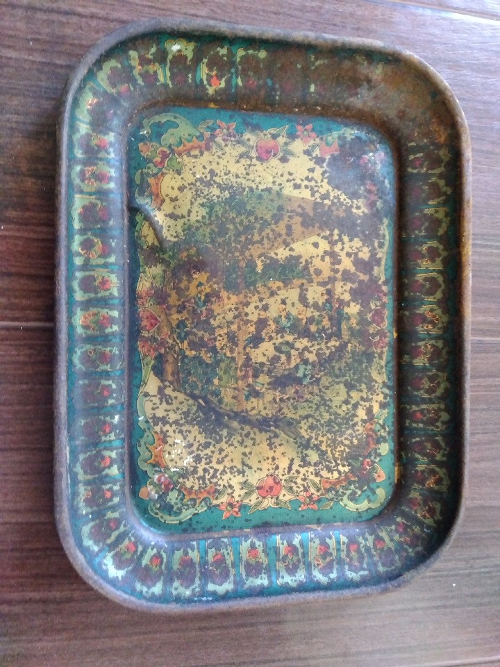 Chinese Qing Dynasty tin plate, nearly 200 years old, with rust and dents.